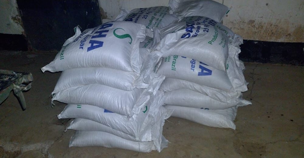 Police Seize Contraband Sugar and Counterfeit Liquor in Raids