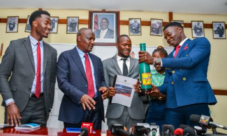 a photo of cs Mbadi and university student leaders.