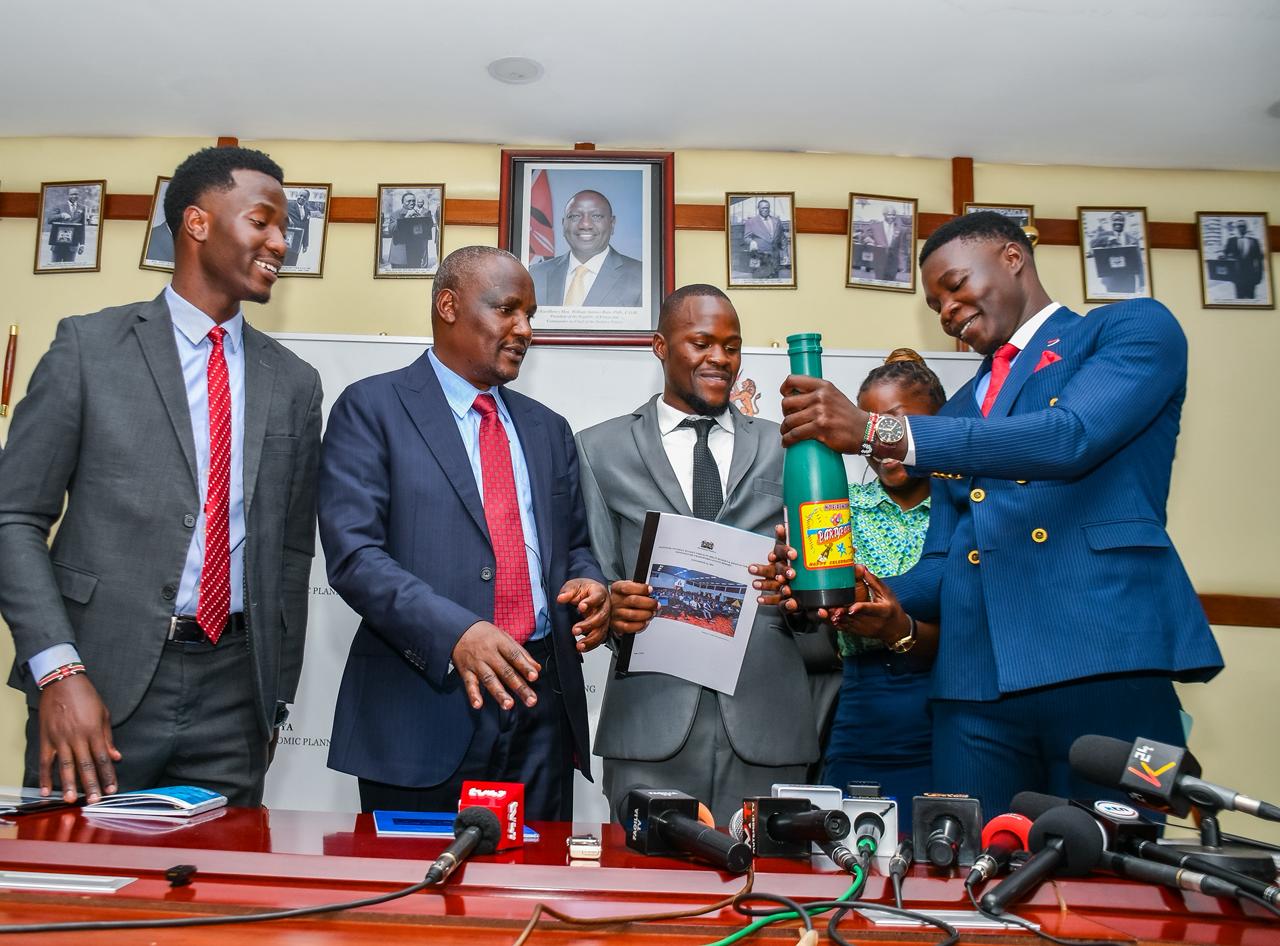 a photo of cs Mbadi and university student leaders.